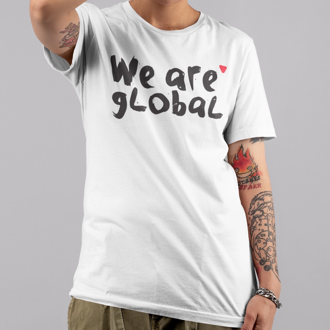 T Shirt Mockup Of An Androgynous Woman With Tattooed Arms At A Studio 32929 Copy Global Underground